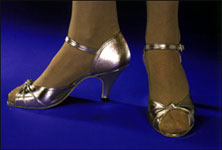Freeds Of London - Classic Twist Open Toe Style #: 6618L. Silver, gold or black leather.2.5 inch heel.Suade soles.