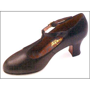 Capezio T.Strap Professional Character Shoe Style #: 800. Closed Toe and a classic T.Strap styling. Full grain leather upper. Leather sole and top lift. Fully leather lined. Cushioned suede socklining. Extra sturdy full breasted 2-3/4 inch heel for professional quality support. Worn as a character or as a tap shoe. Taps not included.

*** Did you know? This shoe can also be made in variety of other leather and satin colors. $50.00 additional charge. Call for details ***