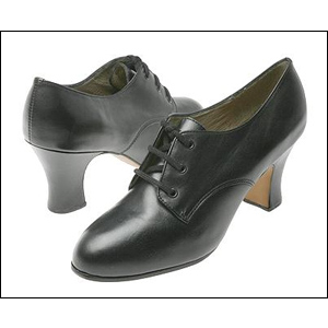 Capezio-Femme Oxford Character / Tap Shoe Style #: 815. Classic performance shoe. Full grain leather upper. Leather sole and top lift. Fully leather lined. Cushioned suede socklining. Extra sturdy full breasted 2 1/2 inch heel for professional quality support. Taps not included.

<br> Did you know? This shoe can also be made in variety of other leather and satin colors. $50.00 additional charge. Call for details.

<br> This is a special-order shoe. Please allow 4-6 weeks for shipping. Limited stock is available,if placing a rush order please call to check availability.