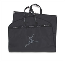 Capezio garment bag Style #: 90. 43. Capezio® and Lena logo identity. Nylon fabric with web handles. Front zip closure and ID pocket. Folds and snaps closed to half length. Hanger ring for easy stowing on planes or locker.
<br>
24Inch W x 42 1/2Inch H