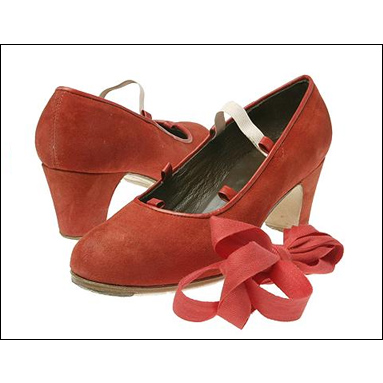 Freed of London Flamenco With Ribbon Tie Style #: FREED-GOYESCO. Style # Goyesco.
<li> A spectacular Flamenco pump manufactured in Spain.<br>
<li> Full leather sole with rubber half sole.<br>
<li> Nails are hand-hammered into the heels and toes for a clear, traditional sound.<br>
<li> 2 inch flamenco heel.<br>
<li> Elegant ribbon ankle tie.<br>
<li> allow 3-4 weeks for delivery<br>