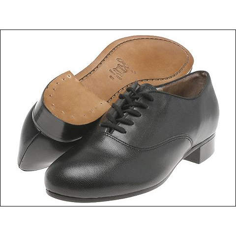 Capezio Pro.Character Tap Oxford Style #: K360. The Character Tap Oxford is renowned throughout the world as the shoe of choice for professional tap dancers. Our highly skilled SMU department developed this exceptional design, incorporating components that create great sound and provide comfort and flexibility. The high quality, full-grain leather gives this shoe flexibility for toe stands and has a 3/4" stacked leather heel that enhances the sound when tapping. Available in classic Oxford design (Shown),or old-fashioned Wing Tip Design.Taps not included. Narrow widths available in Black color only.

<li> CAN BE ORDERED WITH THE SAVION GLOVER "PRO" BUILD-UP - DOUBLE STACKED LEATHER SOLE AND HEEL, ATTACHED TELETONE TAPS WITH SOUND BOARDS,AND "CAT PAW" NON-SKID RUBBER PATCH. AVAILABLE AS A SPECIAL ORDER (SEE SPECIAL OPTIONS BELOW),AND EXPERTLY DONE BY OUR IN-HOUSE COBBLER. FINAL SALE. ALLOW 1-2 WEEKS FOR DELIVERY. $125.00 <br>

<li> DID YOU KNOW? THIS SHOE CAN ALSO BE MADE IN VARIETY OF OTHER LEATHER AND FABRIC COLORS. ALLOW 6-8 WEEKS FOR DELIVERY,$50.00 ADDITIONAL CHARGE, FINAL SALE. CALL FOR COLORS AVAILABILITY.<br>