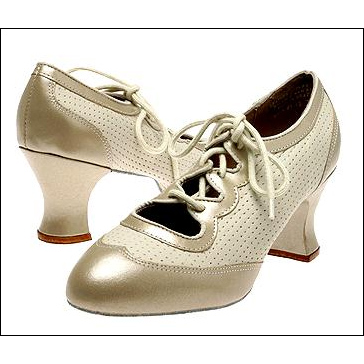 Capezio -Phantom-Ballroom Shoe Style #: BR19. <li> Supple, perforated leather upper with leather trim and wing tip styling.<br>
<li> Cushioned insole.<br>
<li> Full suede socklining, sole and top lift.<br>
<li> A new 2inches flared heel.<br>
<li> Cotton laces.<br>
<li> Excellent practice shoe.<br>
<li> 2 inches heel