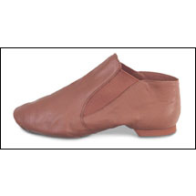 Capezio - Split Sole,Slip on Jazz Boot Style #: CG05C. This jazz boot from Capezio® hugs the foot with comfortable elastic instead of laces. The fit is smooth and secure, producing an unbroken line. Soft, supple leather and split-sole construction create great flexibility and a beautiful arch.