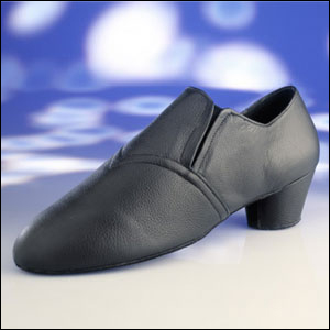 Freed "Profile" Men's Latin Slip-On Shoe Style #: Freed "Profile". Men's, slip-on, ultra soft leather shoe with elastic gussets and suede sole. Available in sizes 5 to 14 including half sizes. Medium and wide widths. Rounded cuban heel. Available in Black leather.